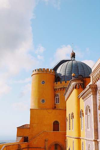 building orange and grey castle turret dome