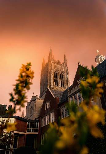 spire photography of castle steeple