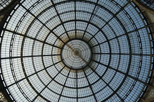 building round round white and black frame window