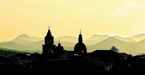 building silhouette photography of cathedral under clear sky dome