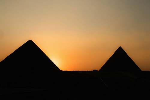 building two pyramid during golden hour pyramid