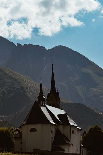 building white and black church spire