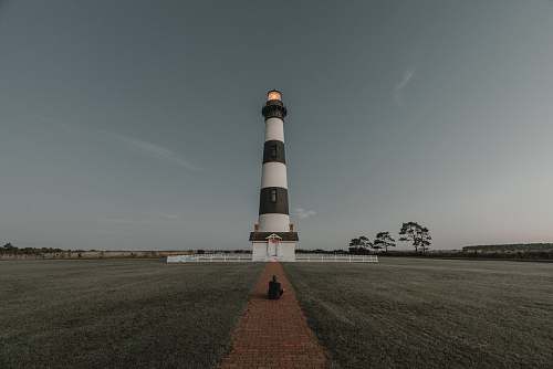 building white and black lighthouse miniature tower