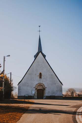 building white and blue church spire
