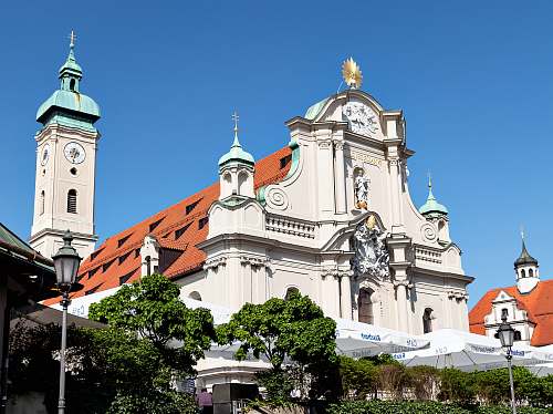building white and brown cathedral tower
