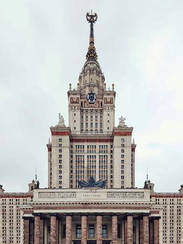 tower white and brown concrete building clock tower