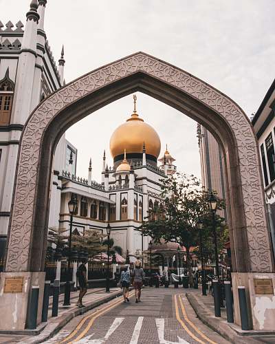 building white and brown concrete mosque during daytime dome