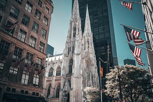 building white cathedral on focus photography spire