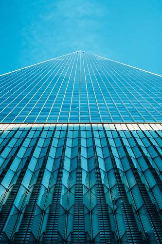 blue worm's eye view of glass buildings building