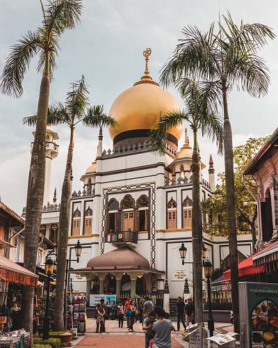 building yellow and white mosque dome