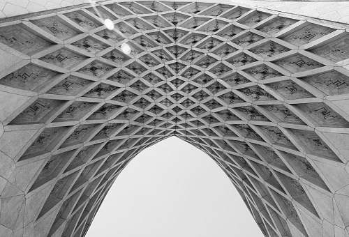 architecture low angle photo of gray concrete ceiling building