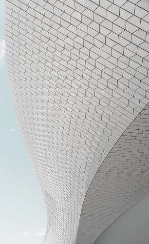 grey worm's eye view photography of glass building pattern