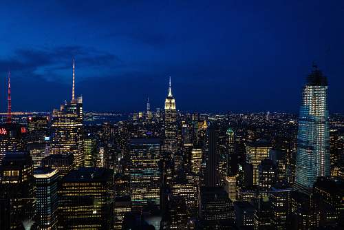 architecture aerial view of buildings during nighttime spire