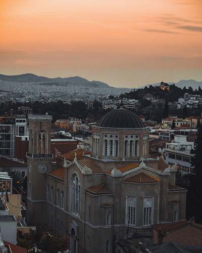 architecture aerial view of city under golden sky outdoors