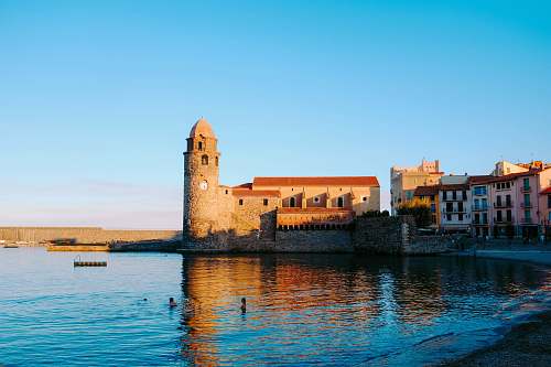 architecture beige castle near body of water castle