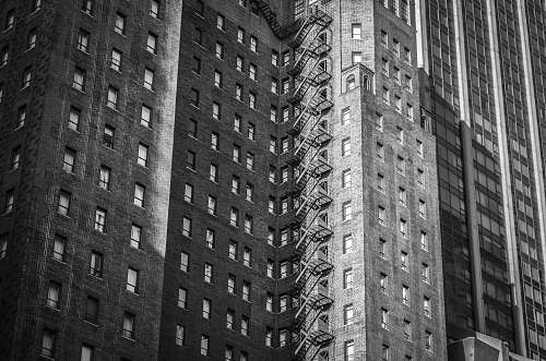 black-and-white black and gray concrete buildings grey