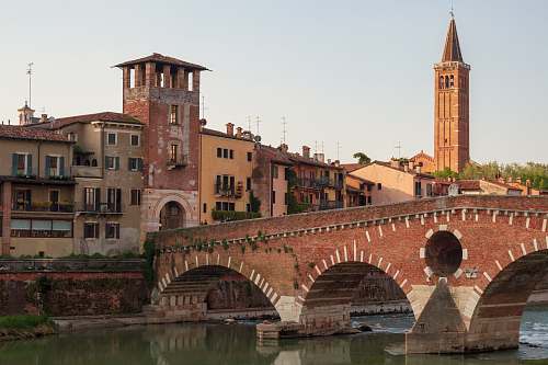 architecture bridge near building tower