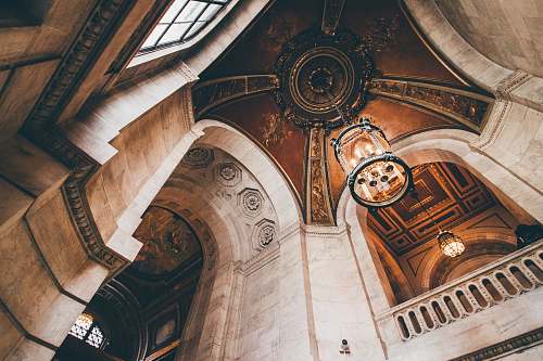 architecture brown concrete building during daytime new york city public library