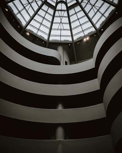 architecture grayscale photo of building staircase