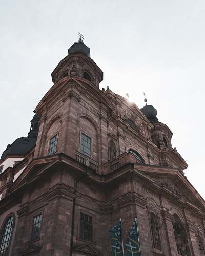 architecture low-angle photo of brown building tower