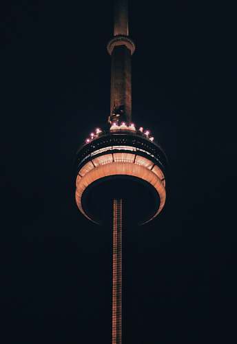 architecture low angle photo of lighted tower tower