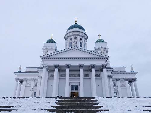 dome white and blue dome building with pillars during daytime architecture