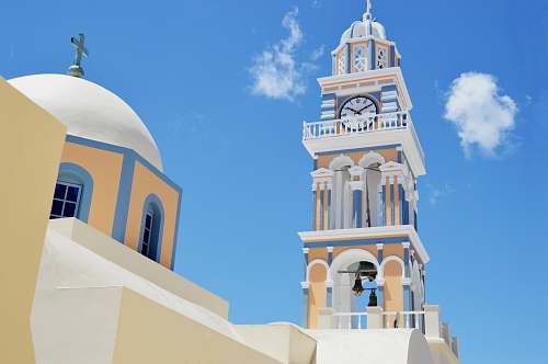 tower white and yellow concrete tower and dome building bell tower