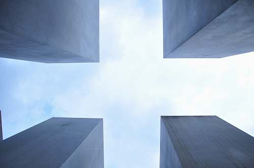 architecture worm's eye view of four stone structures during daytime berlin