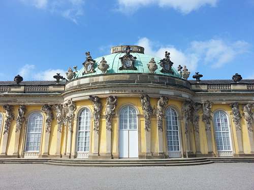 house yellow, white and blue domed building palace