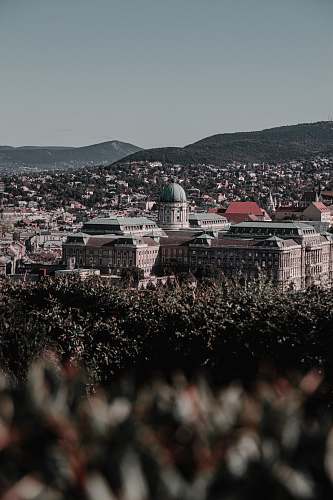 nature high-angle photography of dome top building under gray sky outdoors