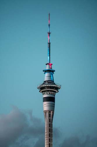 steeple concrete tower during daytime spire