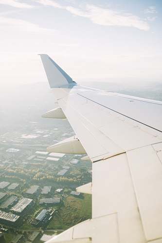 travel plane right wing aircraft