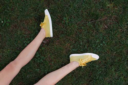 clothing yellow-and-white low-top sneakers footwear
