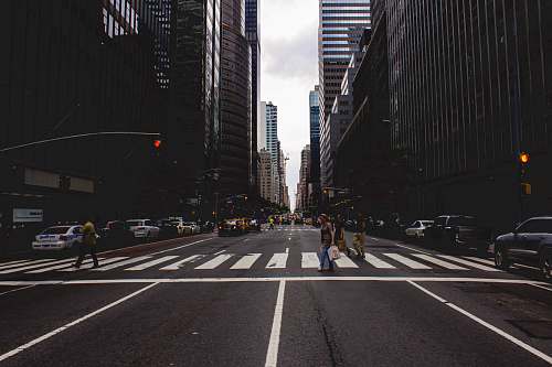 road people walking on pedestrian lane intersection