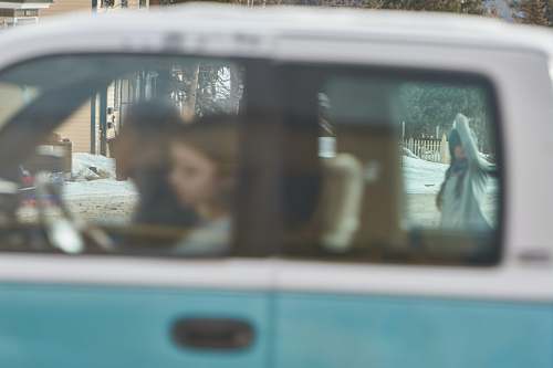 car man and woman riding vehicle transportation