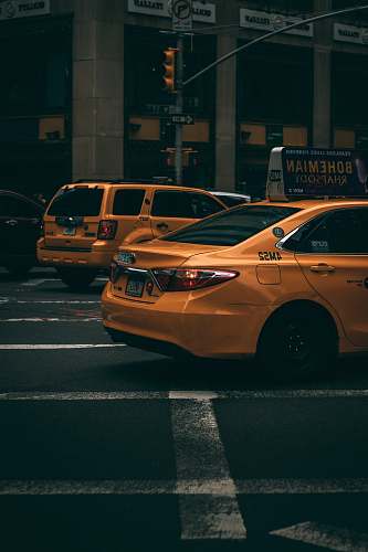 cab orange cars on road car