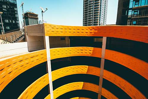 handrail top-view photography of spiral building rainbow garage
