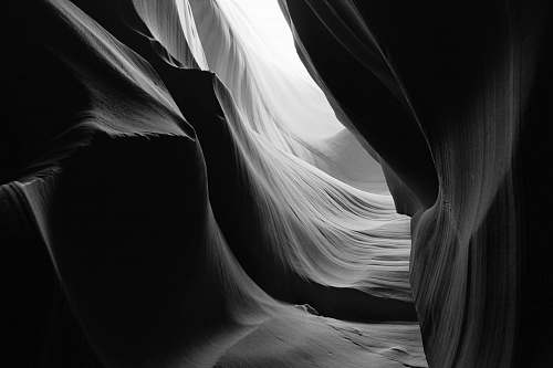 grey grayscale photo of landscape antelope canyon