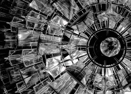 machine grayscale photography chandelier engine