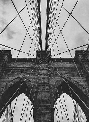 building grey suspension bridge bridge