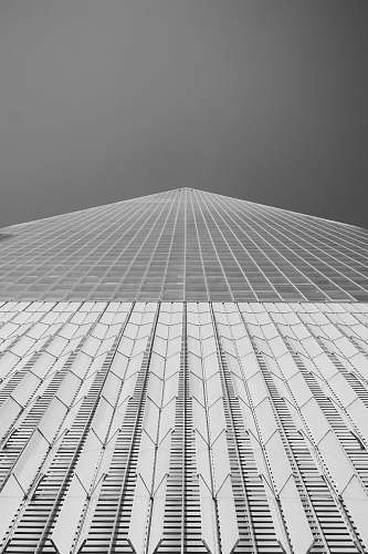 building low angle photography of high rise building grey