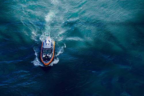 transportation aerial photography of boat on body of water vehicle