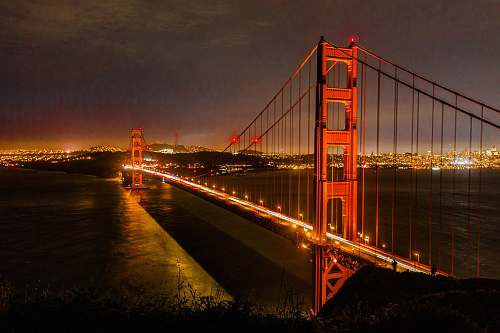 building San Francisco bridge during nighttime golden gate bridge