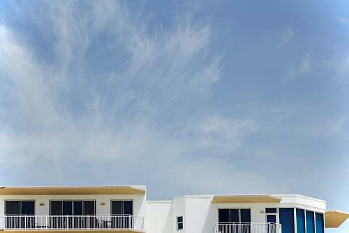 countryside architectural photography of white painted house hut