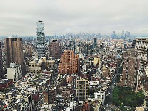 city city with high-rise buildings under white skies town