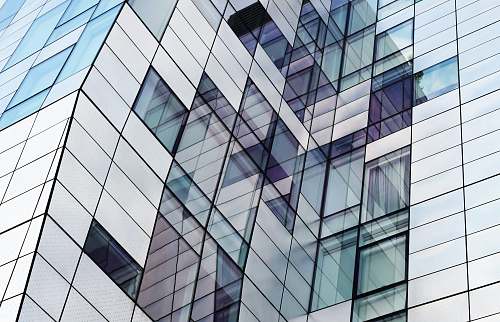 architecture closeup photography of glass window building new york