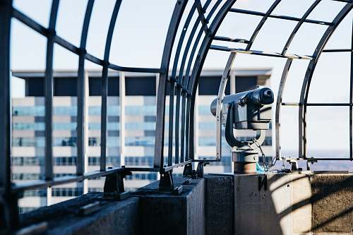 minneapolis gray and black telescope beside rail architecture