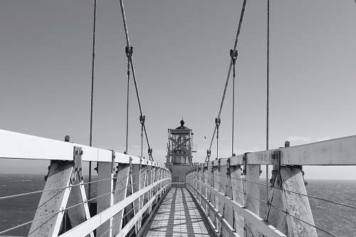 grey grayscale photography of wooden dock black-and-white