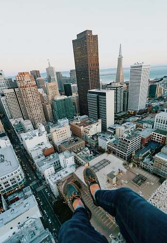city person sitting on rooftop of building san francisco