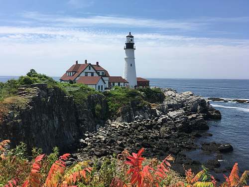 lighthouse photo of black and white lighthouse architecture